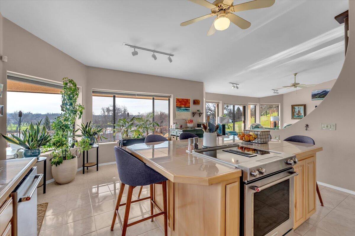22560 Adobe Road Red Bluff, CA 96080 - Photo 19 of 49 a view of a dining room with furniture window and outside view