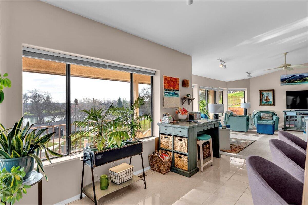 22560 Adobe Road Red Bluff, CA 96080 - Photo 20 of 49 a living room with furniture and a potted plant