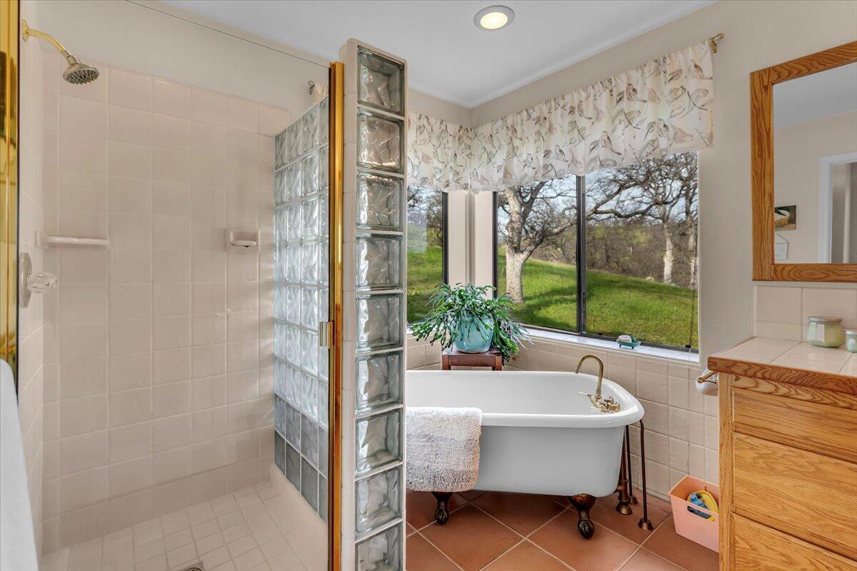 22560 Adobe Road Red Bluff, CA 96080 - Photo 26 of 49 a bathroom with a sink and a mirror