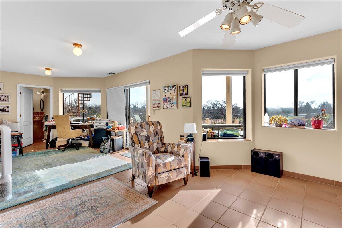 22560 Adobe Road Red Bluff, CA 96080 - Photo 34 of 49 a living room with furniture and a large window