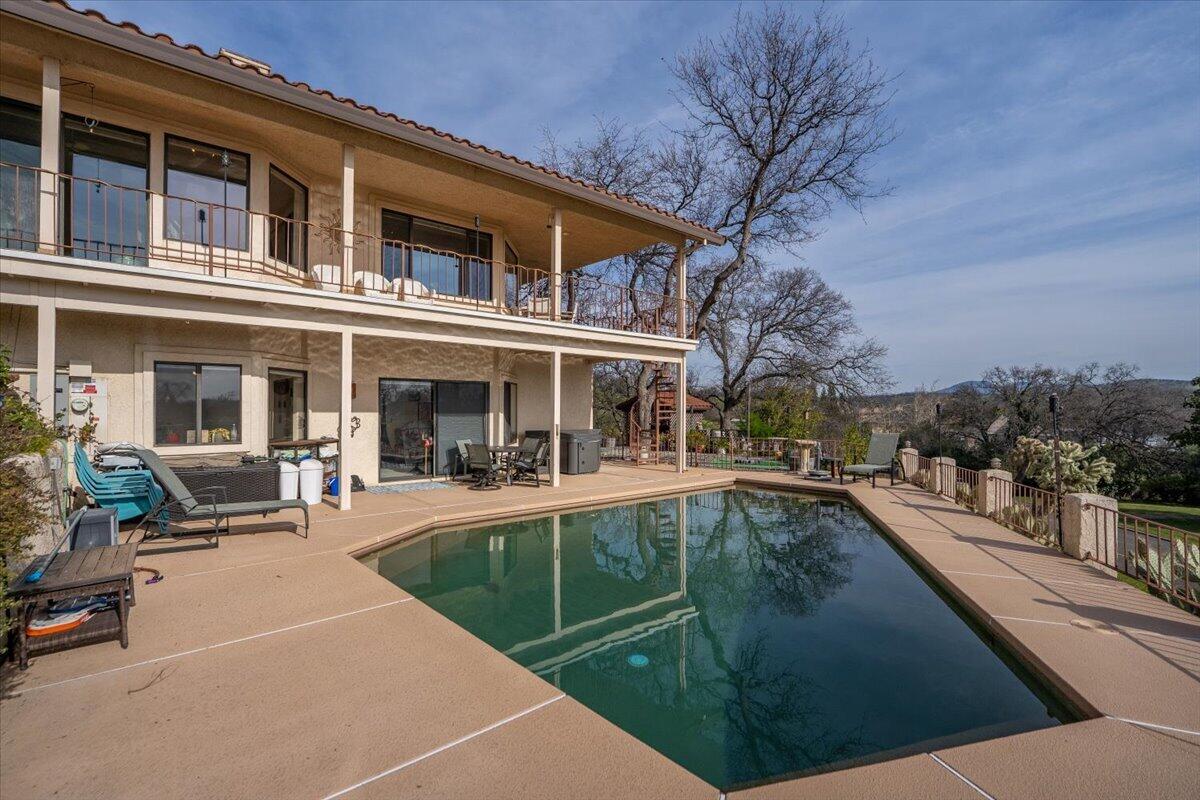 22560 Adobe Road Red Bluff, CA 96080 - Photo 36 of 49 a view of a building with a patio