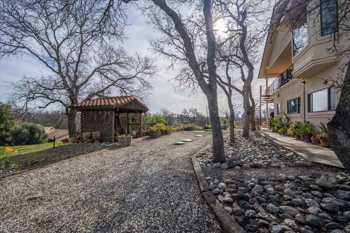 22560 Adobe Road Red Bluff, CA 96080 - Photo 40 of 49 a view of a house with a yard and tree s