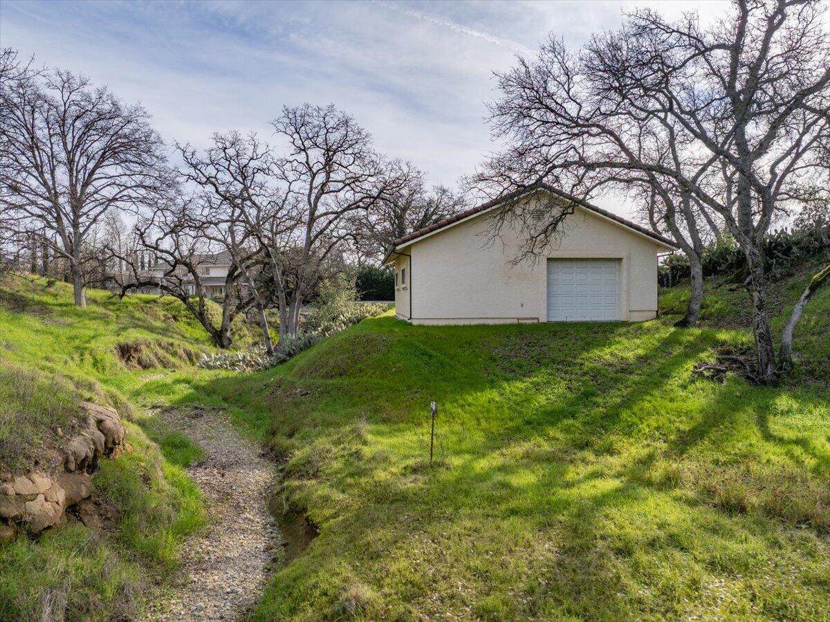 22560 Adobe Road Red Bluff, CA 96080 - Photo 41 of 48 a view of a backyard of the house