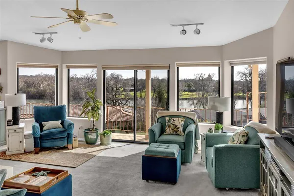 a living room with furniture and a window