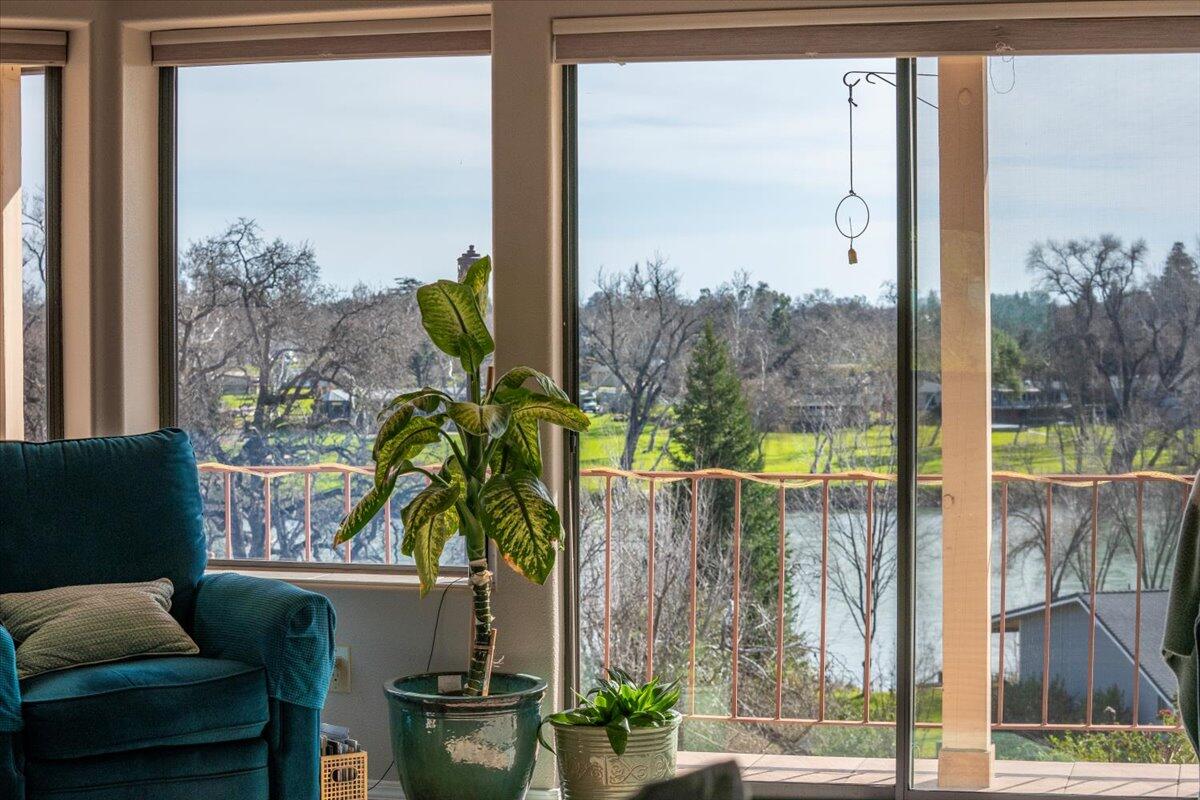 22560 Adobe Road Red Bluff, CA 96080 - Photo 10 of 49 a vase of flowers sitting on a table with a potted plant
