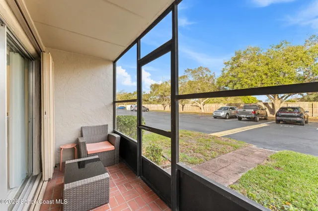 a view of car parked from a window