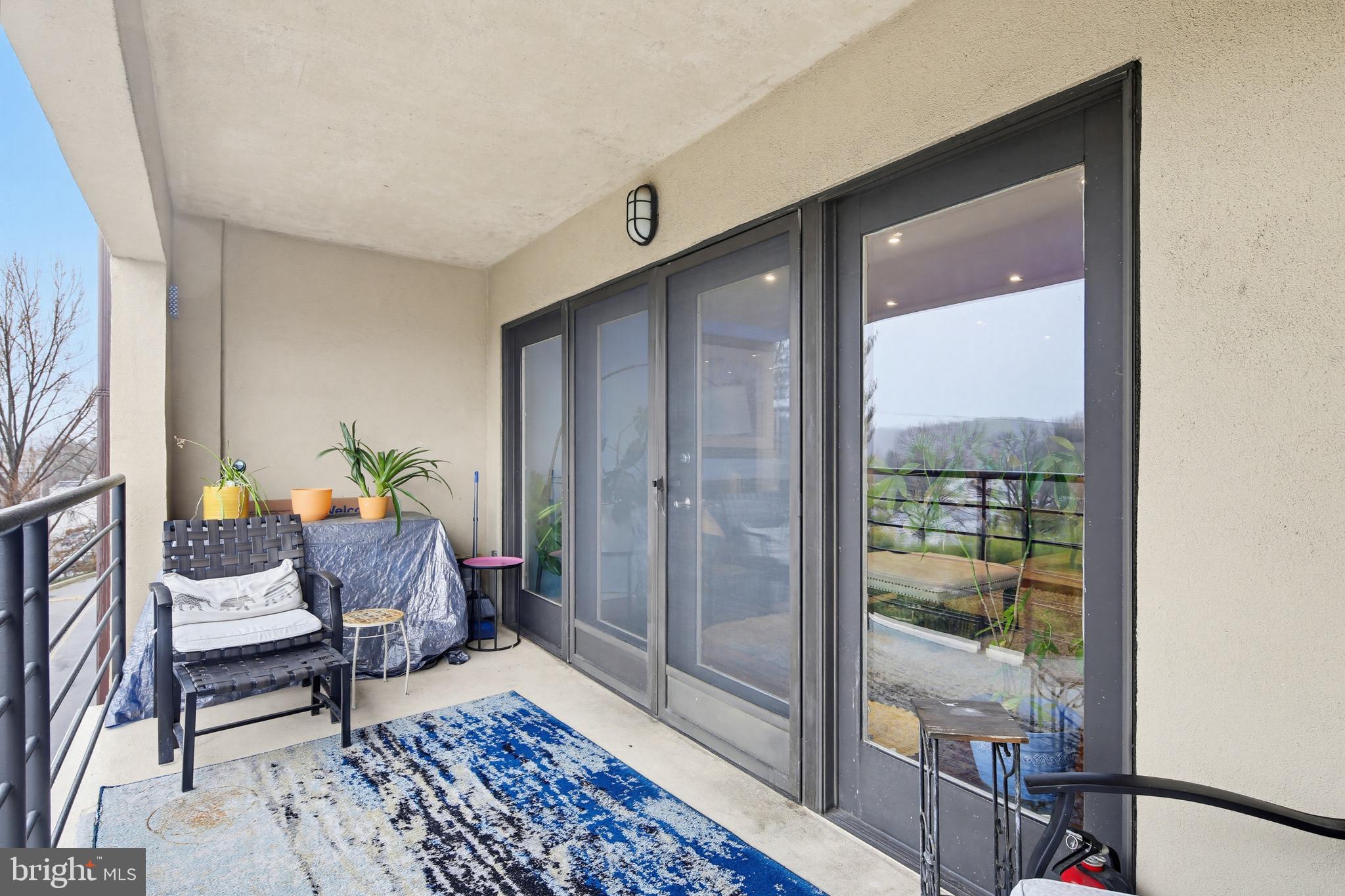 1040 Deer Ridge Drive, Unit 208 Baltimore, MD 21210 - Photo 19 of 30 French door to balcony
