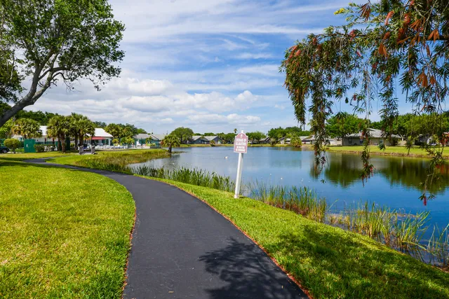 a view of a lake with a city