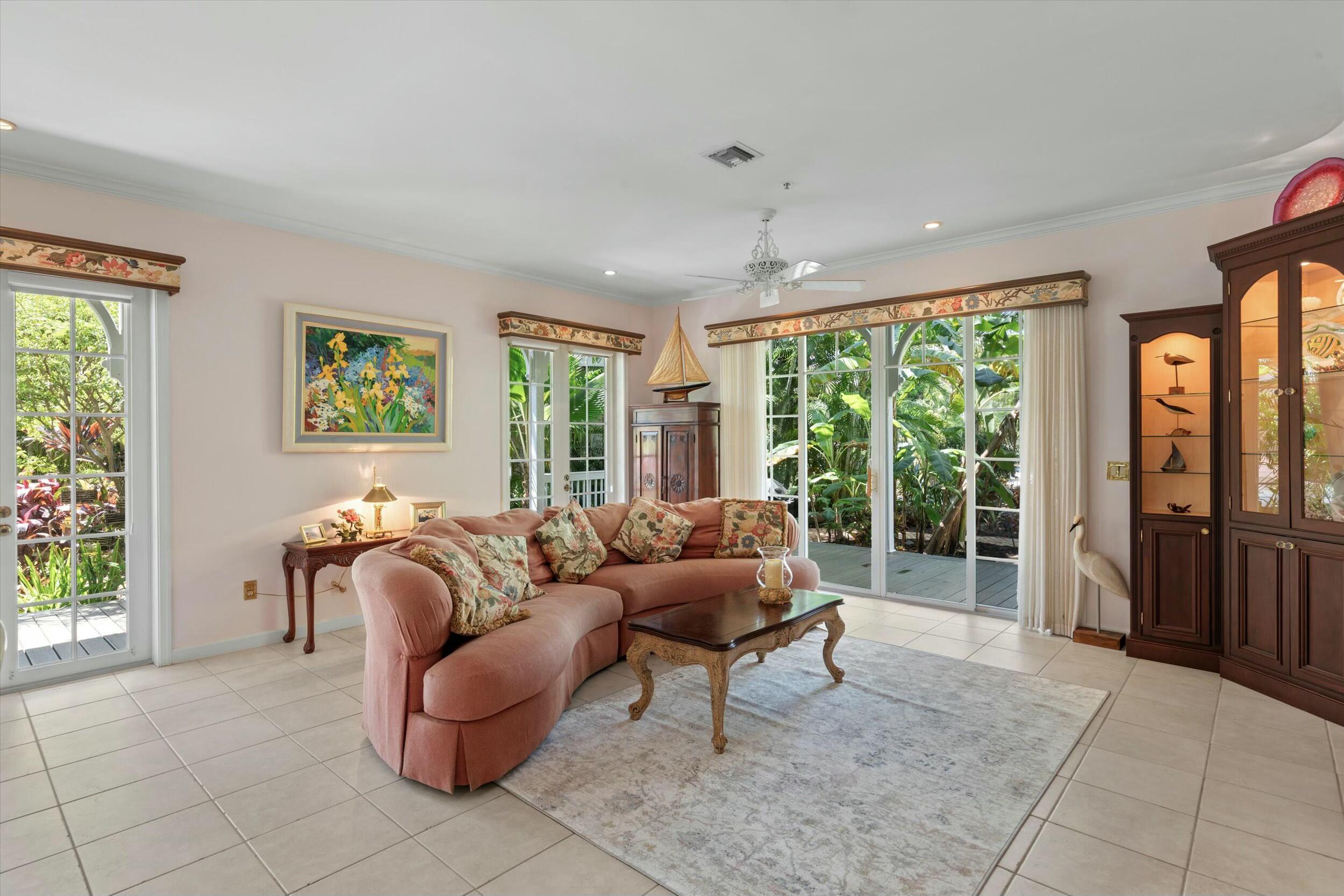 68 Sunset Key Drive Key West, FL 33040 - Photo 14 of 69 a living room with furniture and floor to ceiling windows