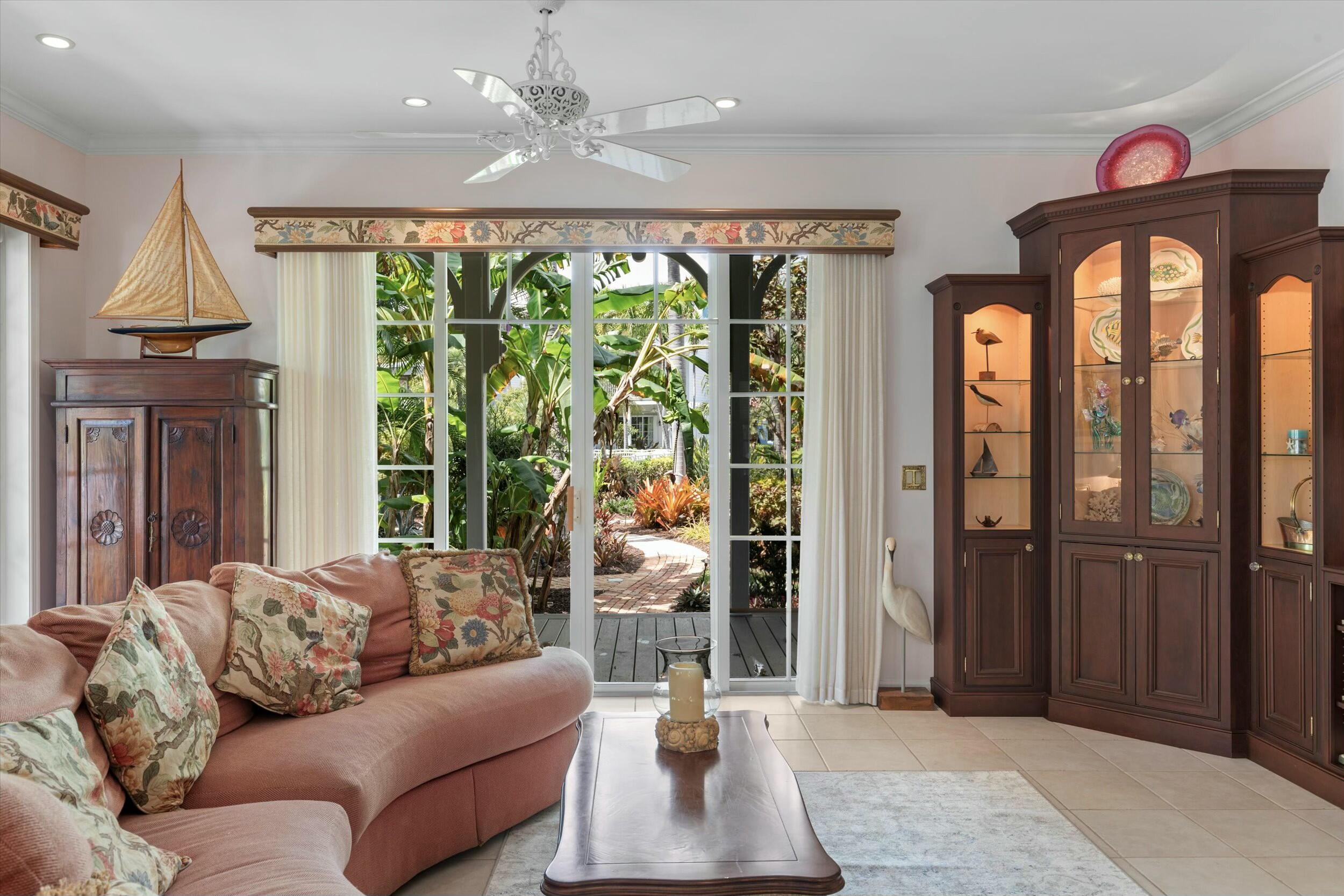 68 Sunset Key Drive Key West, FL 33040 - Photo 15 of 69 a living room with furniture and a large window
