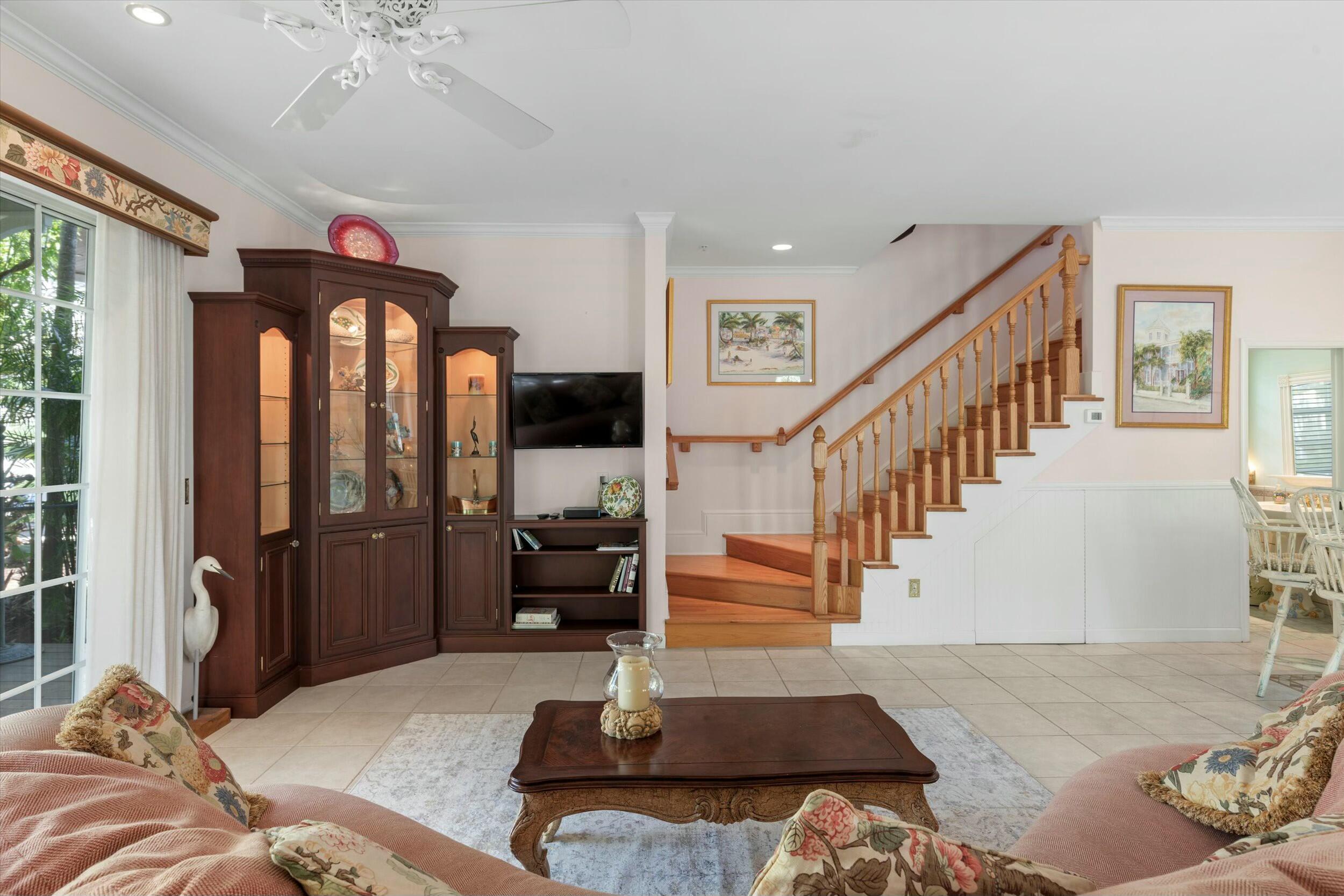 68 Sunset Key Drive Key West, FL 33040 - Photo 17 of 69 a living room with furniture fireplace and a window