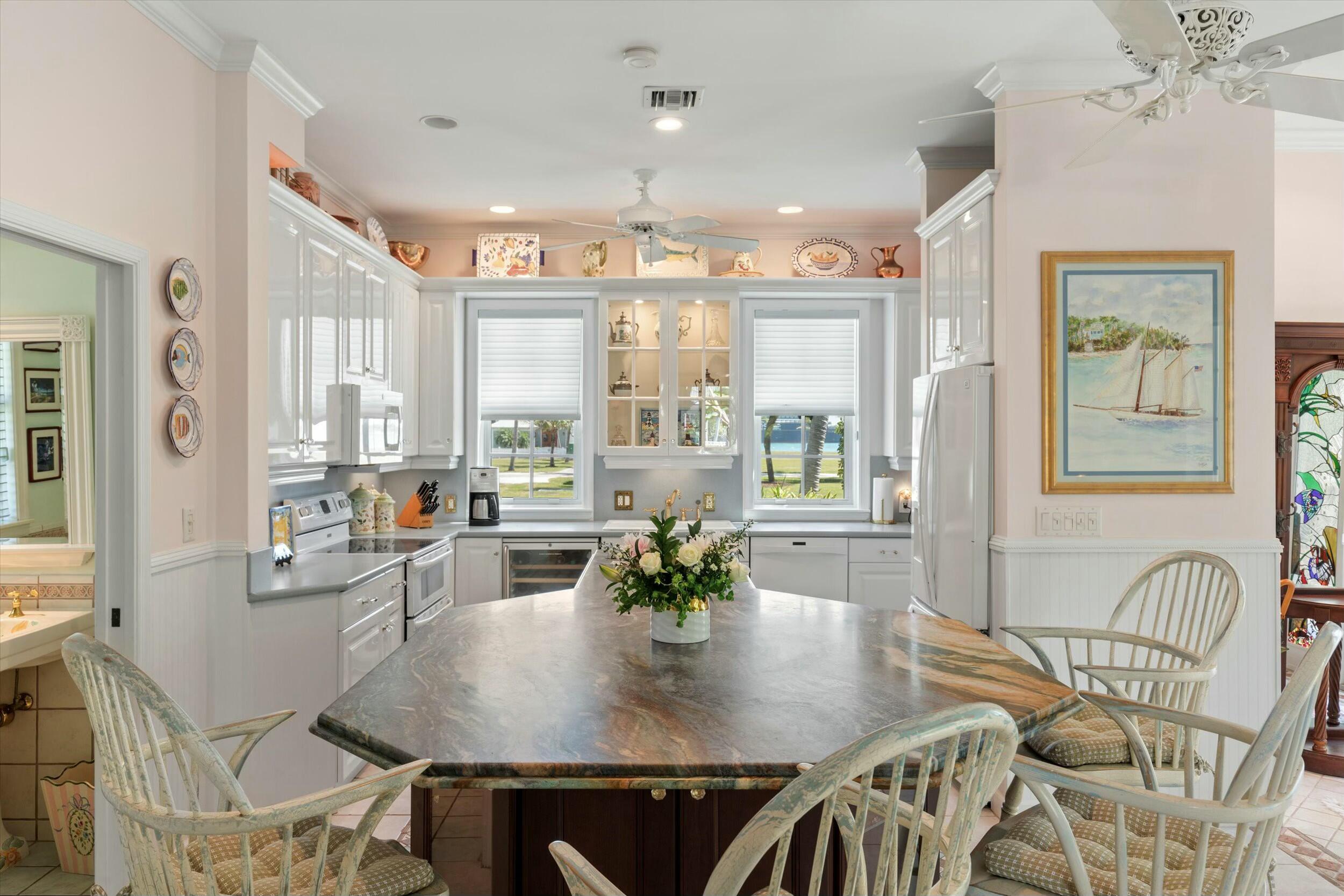 68 Sunset Key Drive Key West, FL 33040 - Photo 21 of 69 a view of a dining room with furniture window and wooden floor
