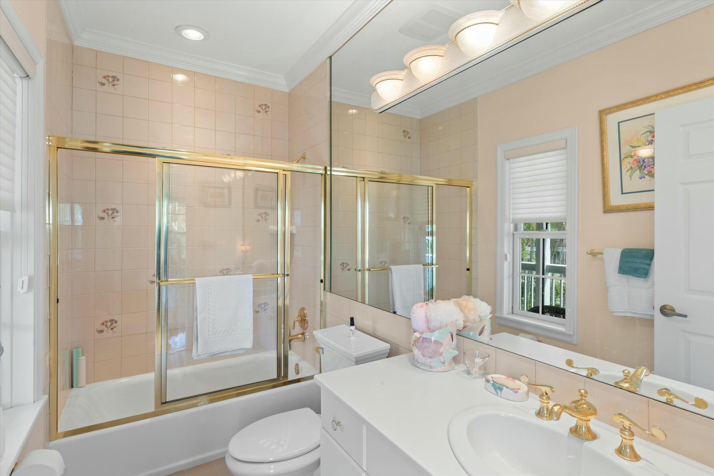 68 Sunset Key Drive Key West, FL 33040 - Photo 48 of 69 a bathroom with a sink toilet and shower