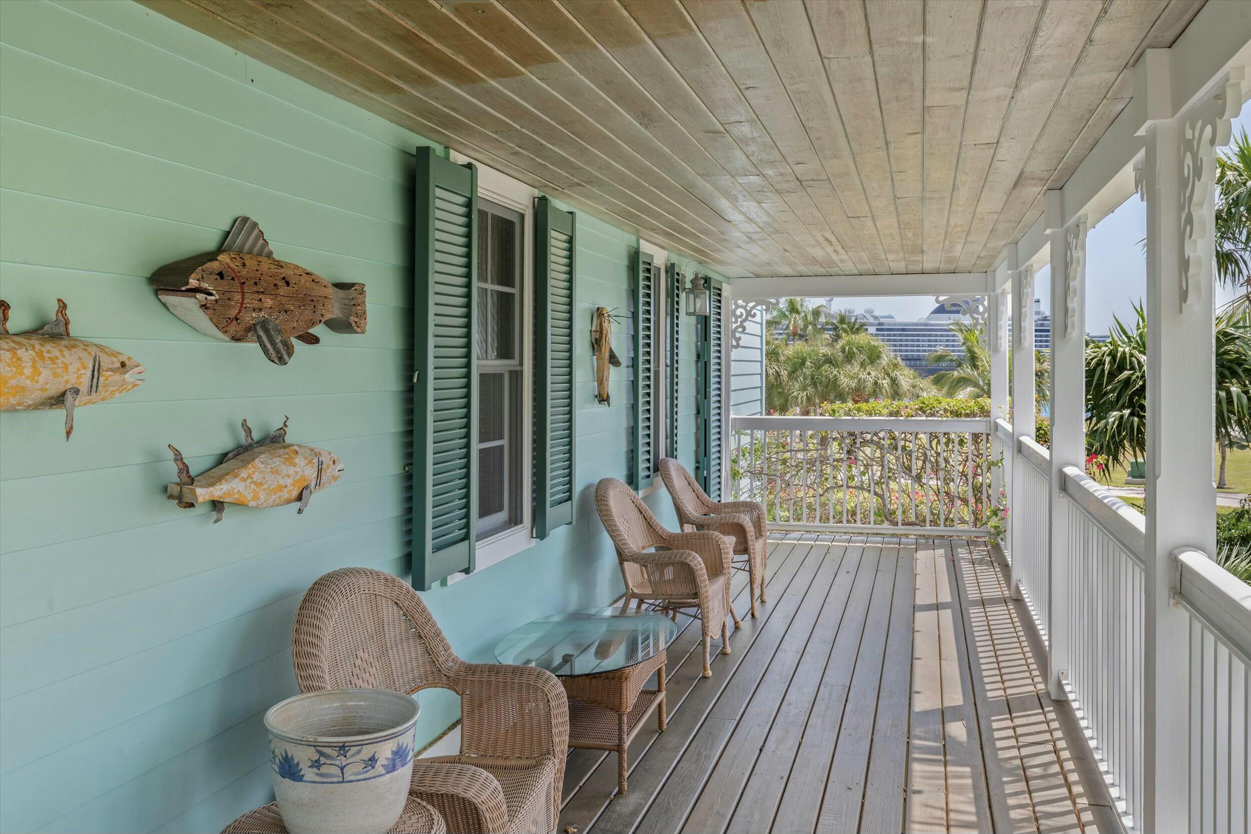 68 Sunset Key Drive Key West, FL 33040 - Photo 60 of 69 a living room with furniture and a large window