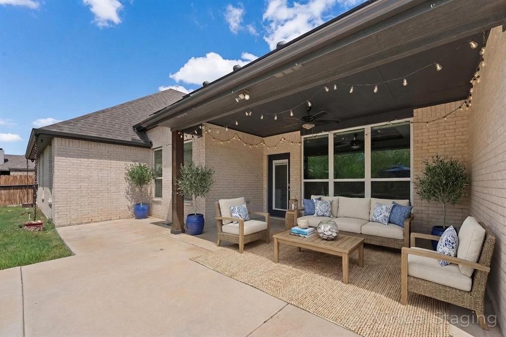 1001 Resolute Road Millsap, TX 76066 - Photo 31 of 40 a building outdoor space with furniture and garden view