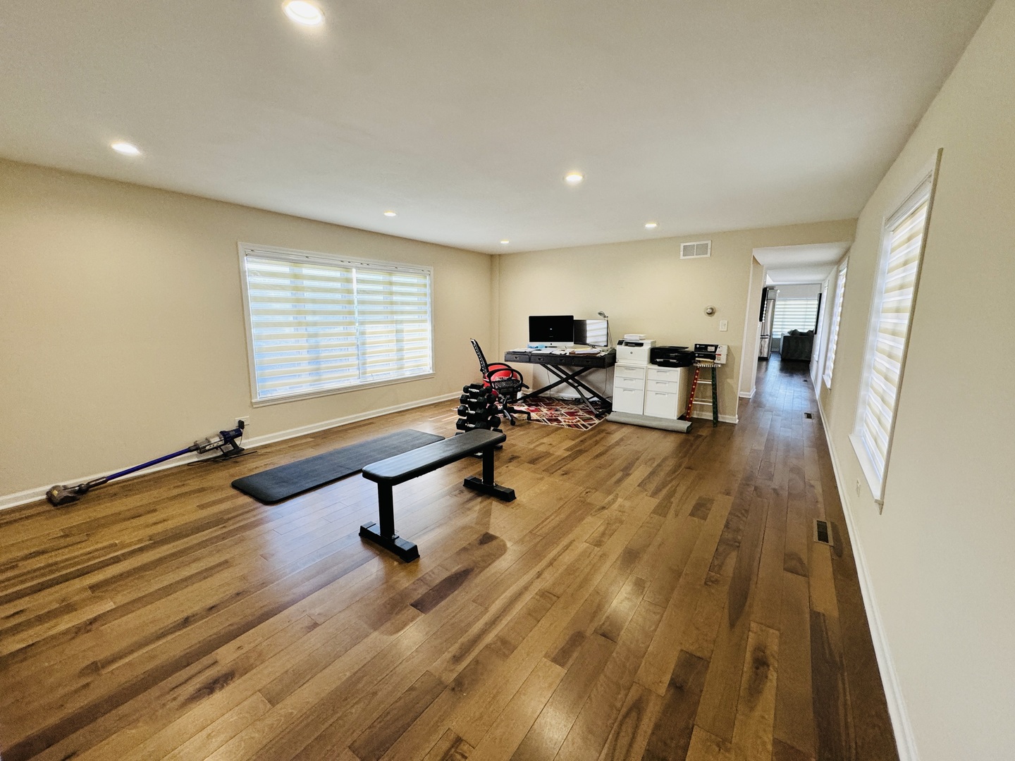 4279 Hilltop Road Long Grove, IL 60047 - Photo 12 of 21 a view of a room with wooden floor and furniture