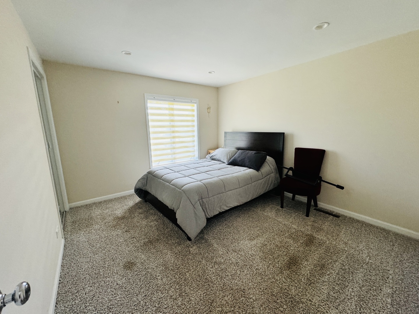 4279 Hilltop Road Long Grove, IL 60047 - Photo 14 of 21 a bedroom with a bed and a couch