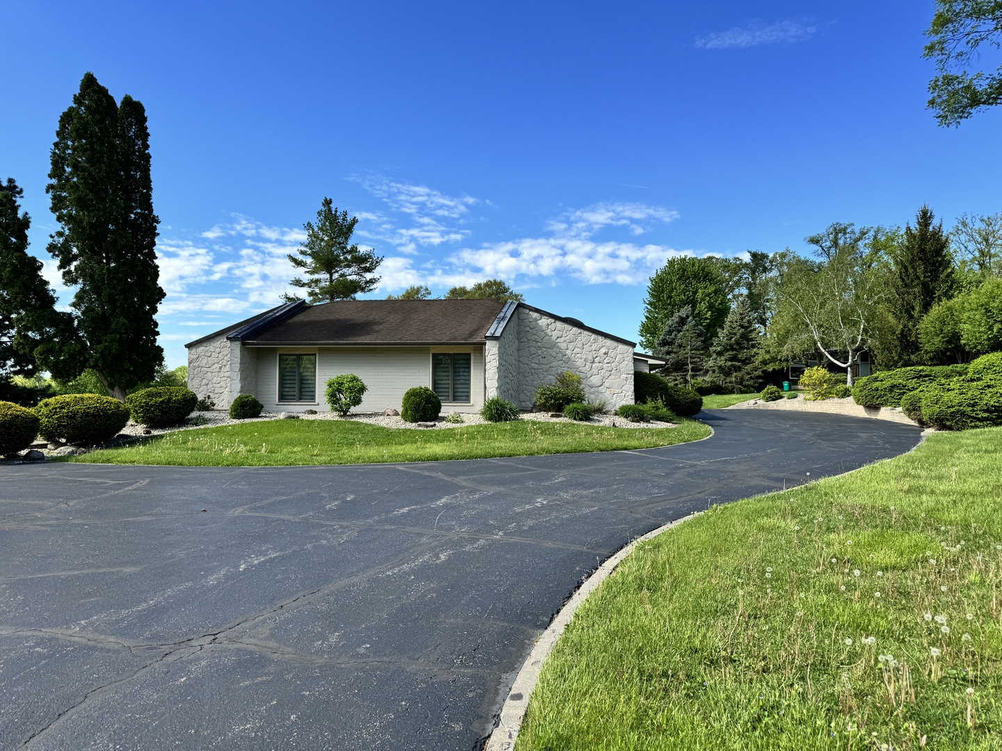 4279 Hilltop Road Long Grove, IL 60047 - Photo 20 of 21 a front view of a house with a yard and garage
