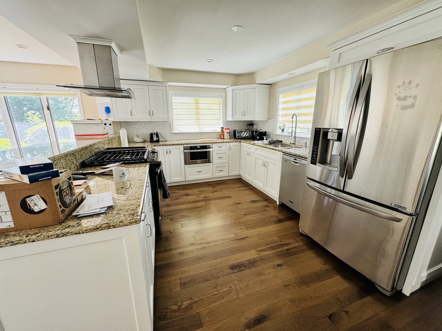 4279 Hilltop Road Long Grove, IL 60047 - Photo 5 of 21 a kitchen with granite countertop a refrigerator stove and sink