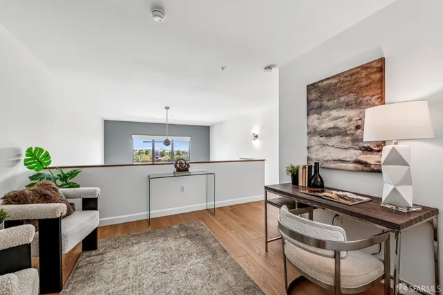 a kitchen with a table and chairs