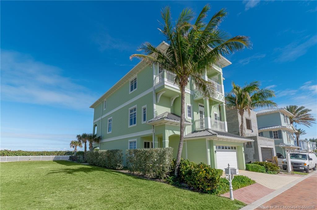 5032 Watersong Way Fort Pierce, FL 34949 - Photo 14 of 55 a view of a house with a yard
