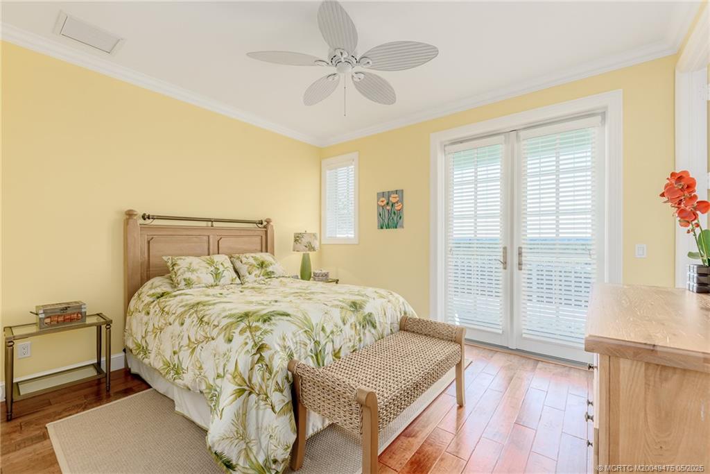5032 Watersong Way Fort Pierce, FL 34949 - Photo 50 of 55 a bedroom with a bed and a window