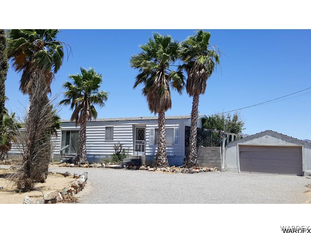 3370 Magma Road Golden Valley, AZ 86413 - Photo 1 of 17 a black and white photo of a house