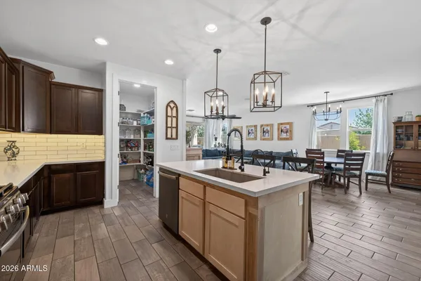 a spacious bathroom with a tub sink shower and mirror