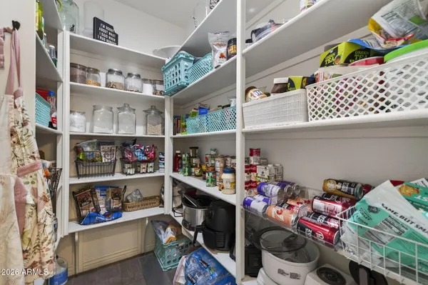 a bathroom with a sink double vanity and a mirror