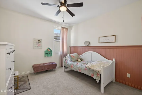 a view of a patio with a table and chairs