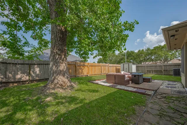 a view of garden with patio