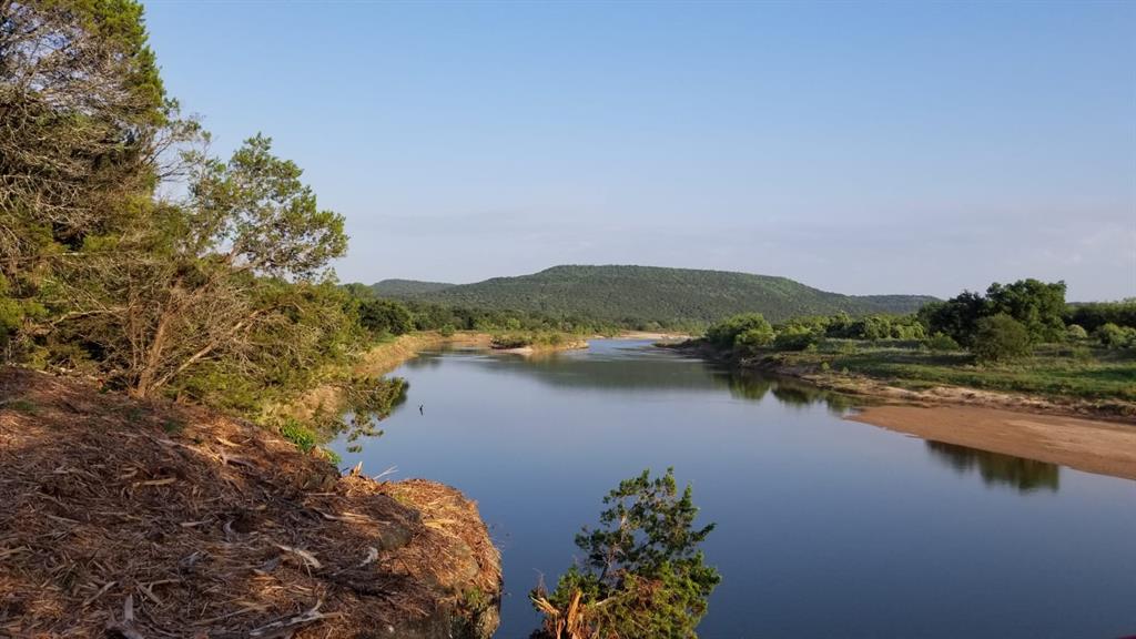 Lot # River Canyon Road Palo Pinto, TX 76484 - Photo 3 of 8 a view of lake with green space