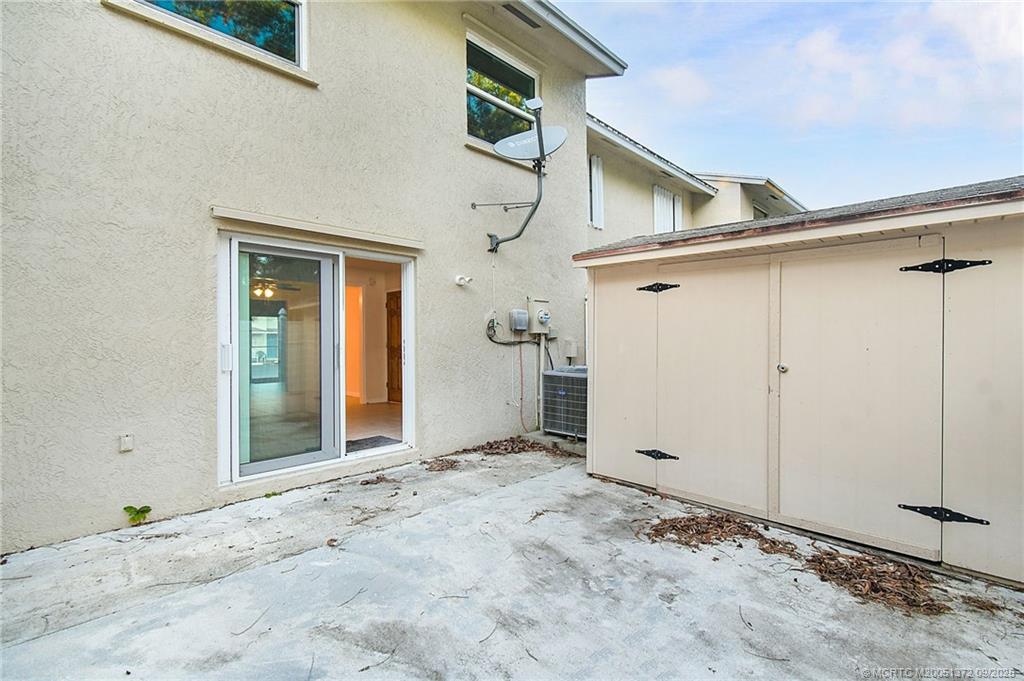 50 Southwest Blackburn Terrace, Unit 8 Stuart, FL 34997 - Photo 33 of 42 a view of an entrance of the house