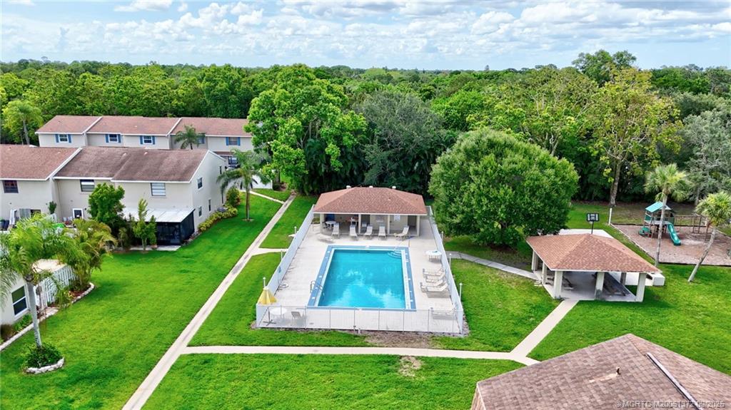 50 Southwest Blackburn Terrace, Unit 8 Stuart, FL 34997 - Photo 38 of 42 an aerial view of a house with big yard