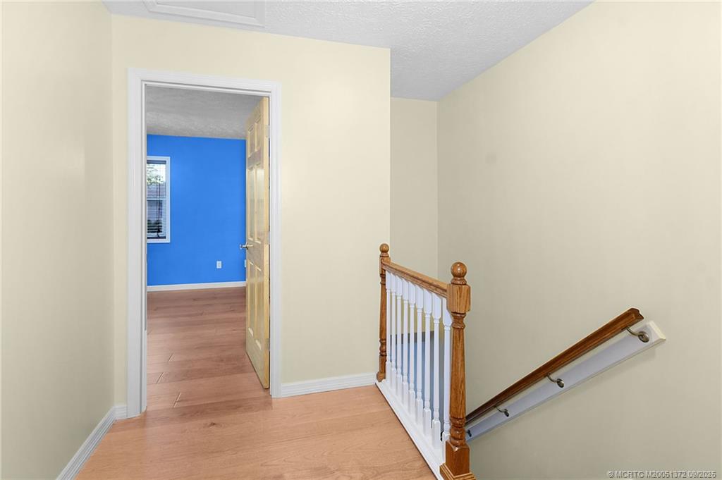 50 Southwest Blackburn Terrace, Unit 8 Stuart, FL 34997 - Photo 10 of 42 a view of a hallway