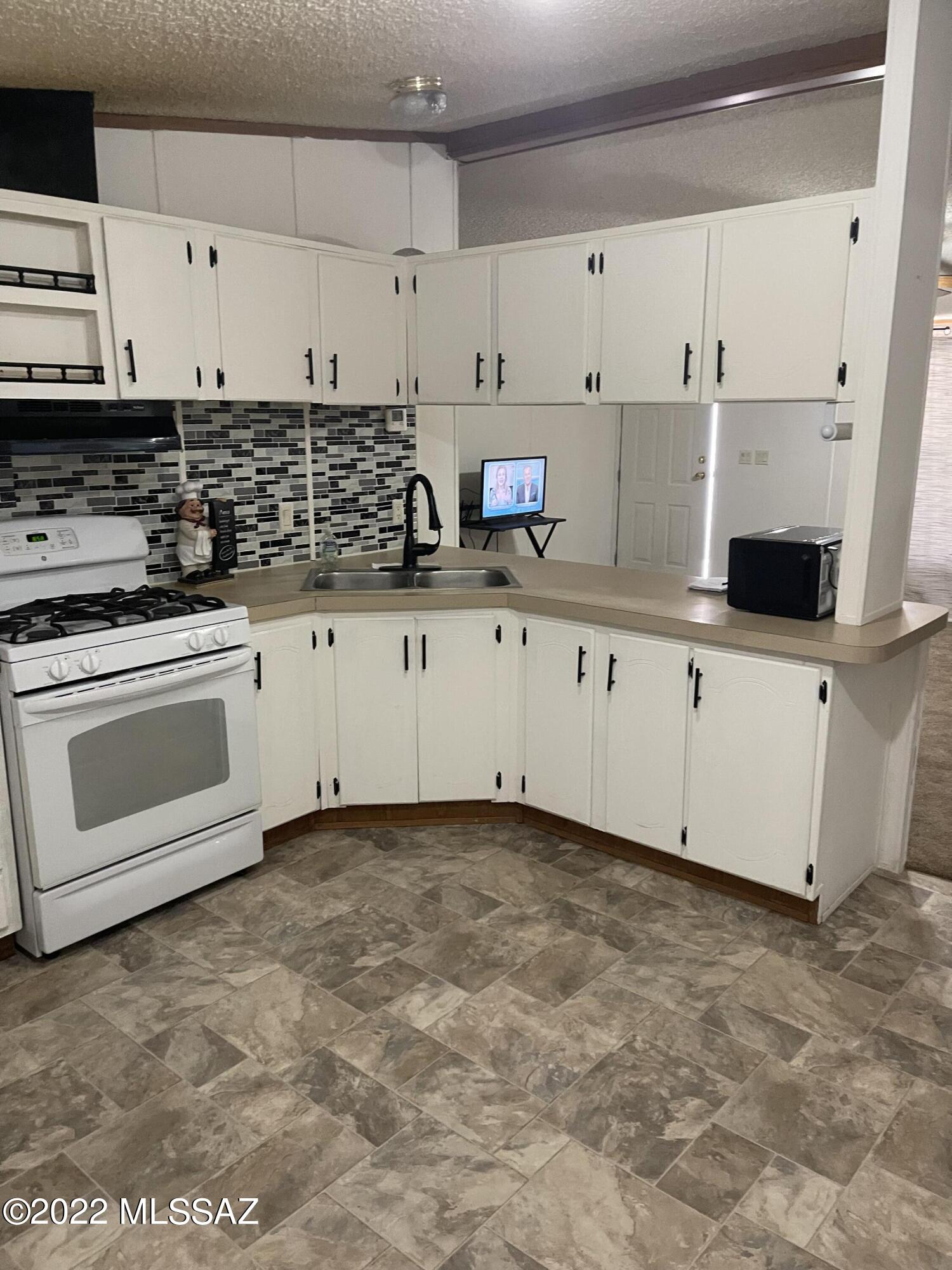 4121 West Tetakusim Road, Unit 2 Tucson, AZ 85746 - Photo 4 of 31