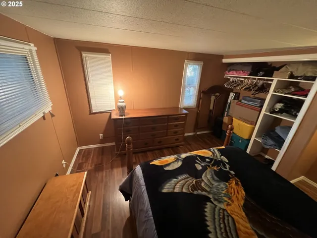 a kitchen with sink a refrigerator and washer