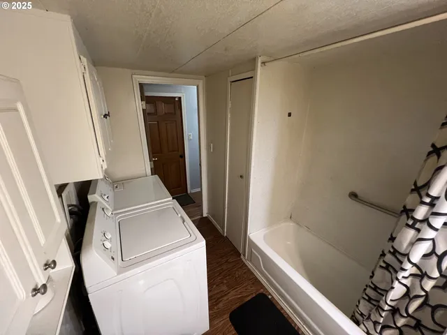 a bedroom with a bed and a closet