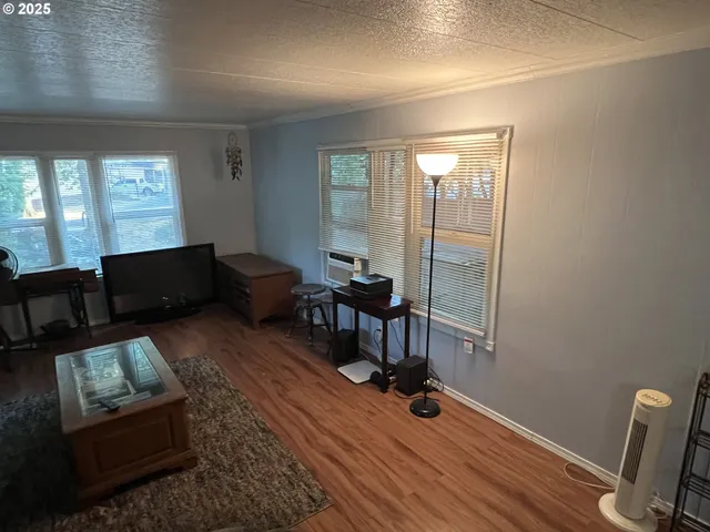 a workspace with furniture and a window