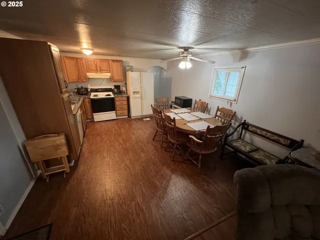 a reading room with furniture and wooden floor