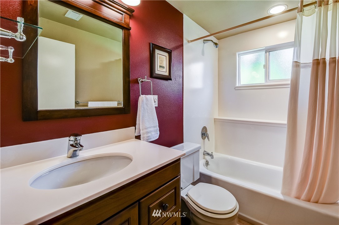 417 212th Street Southwest Bothell, WA 98021 - Photo 16 of 28 a bathroom with a sink toilet vanity and tub