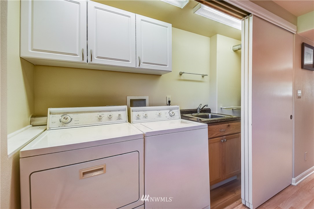 417 212th Street Southwest Bothell, WA 98021 - Photo 21 of 28 a utility room with dryer and washer