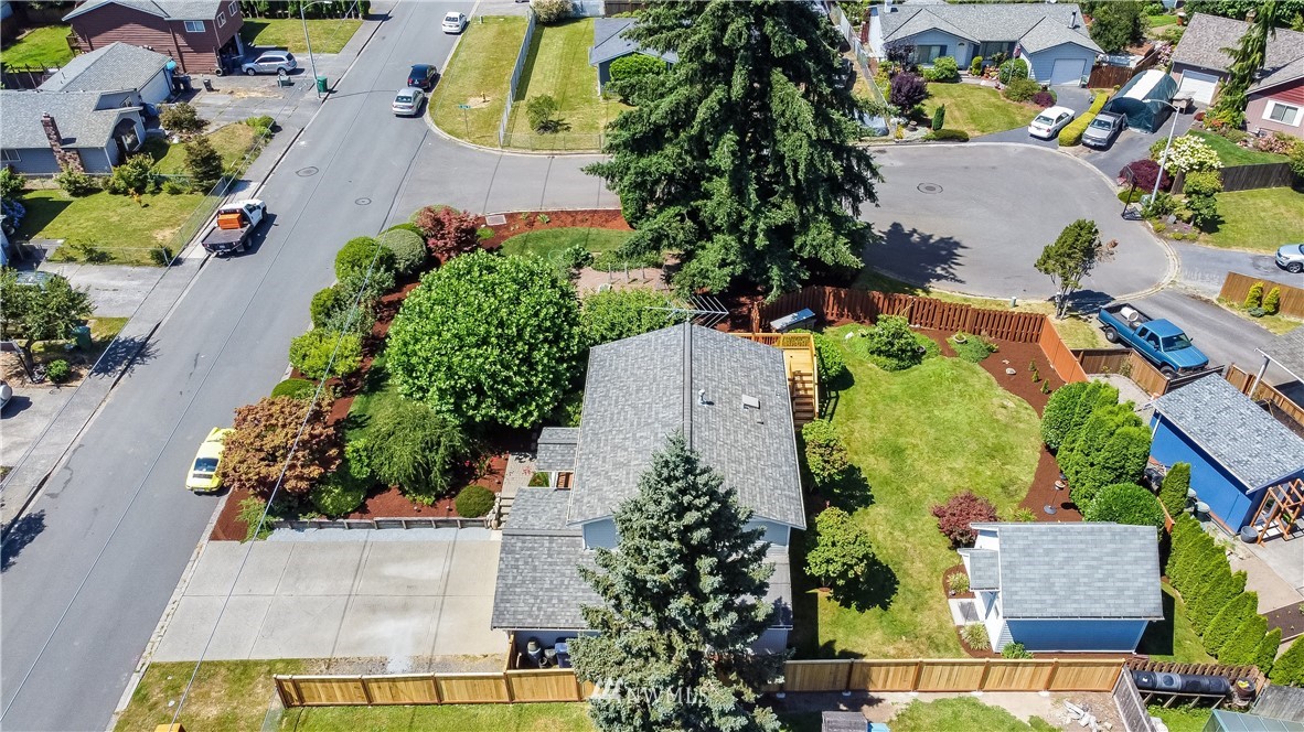 417 212th Street Southwest Bothell, WA 98021 - Photo 28 of 28 an aerial view of a house with a yard and tennis court