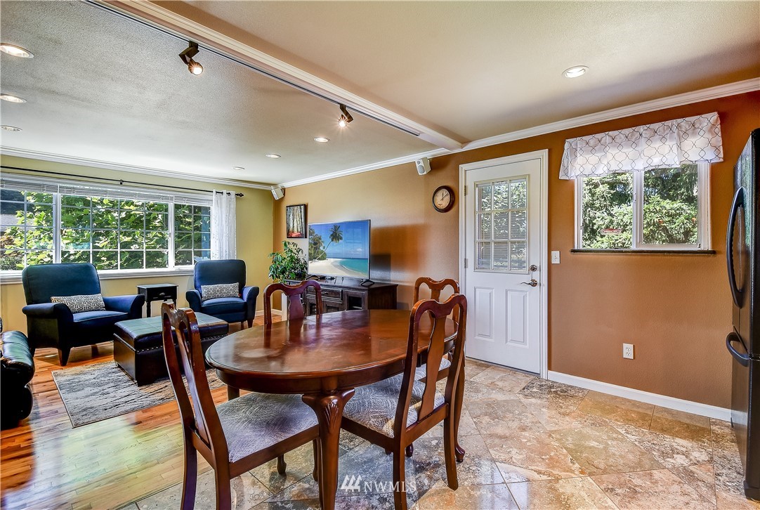 417 212th Street Southwest Bothell, WA 98021 - Photo 8 of 28 a view of a dining room with furniture window and outside view