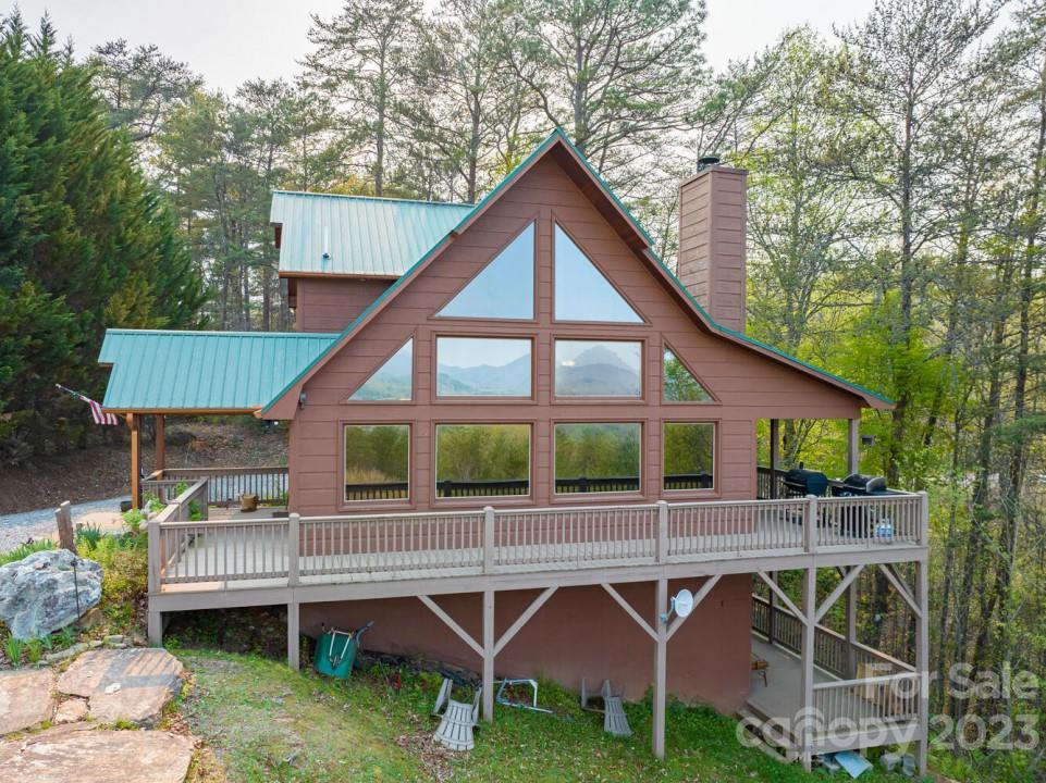 398 Pin Oak Ridge Murphy, NC 28906 - Photo 3 of 30 a view of a house with a yard and sitting area