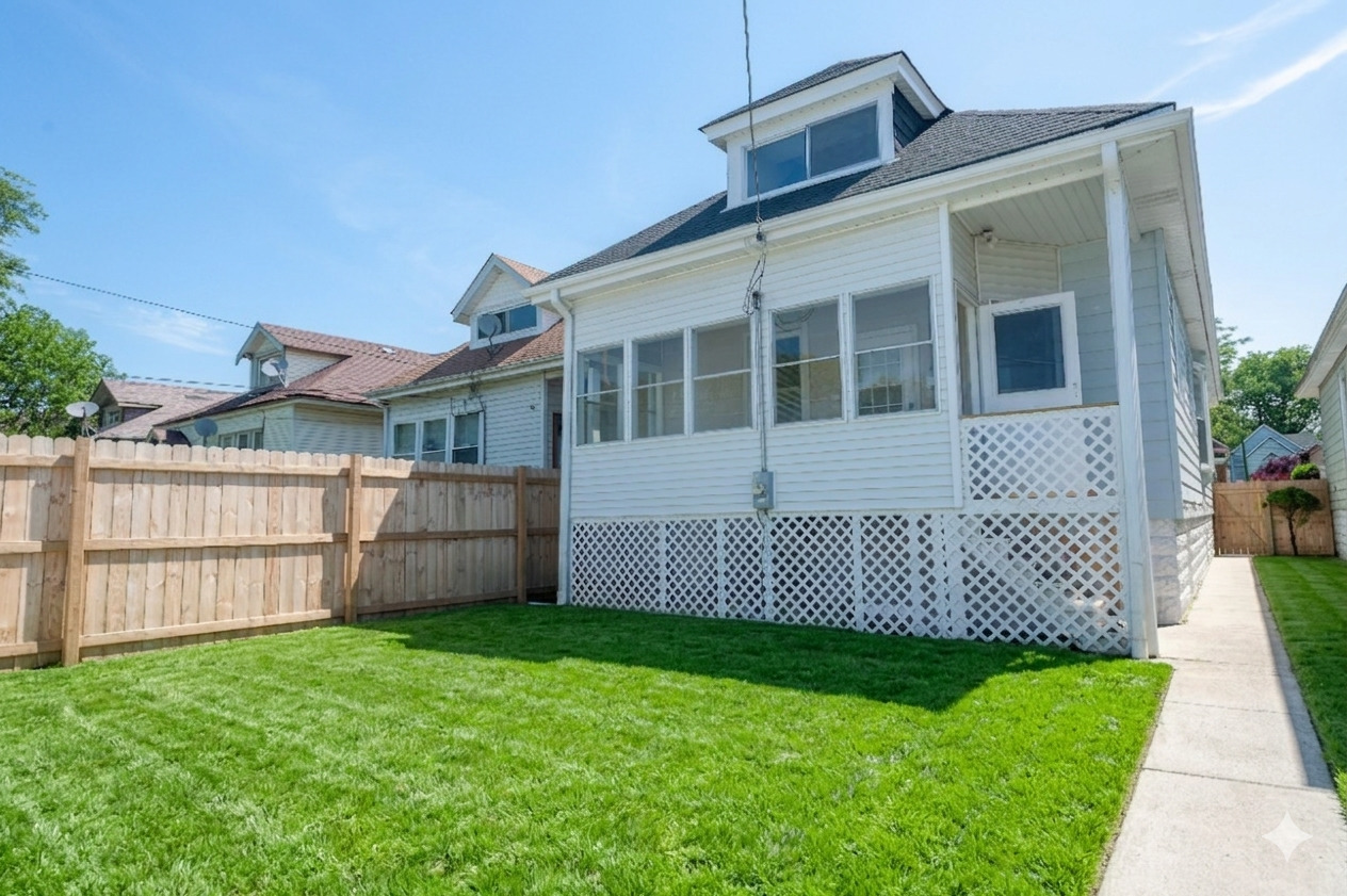 8620 South Union Avenue Chicago, IL 60620 - Photo 6 of 41 a front view of a house with a garden