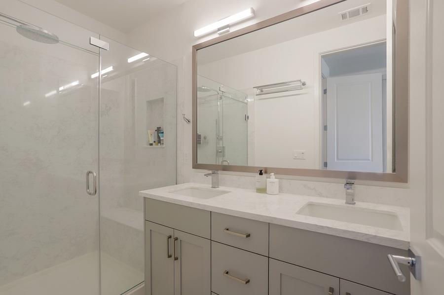 330 Marquetta Circle Mountain View, CA 94043 - Photo 13 of 26 a bathroom with 2 sink and a mirror