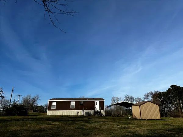 a front view of house with yard