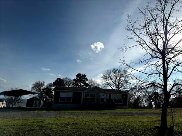 a front view of house with yard
