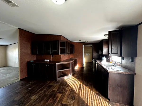 a kitchen with granite countertop lots of counter top space